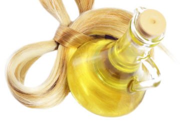Olio di oliva sui capelli secchi: trattamenti e maschere