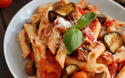 La pasta alla Norma, tradizione culinaria siciliana, esaltazione dei sapori mediterranei